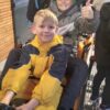 Descente en luge sur rail en hiver