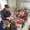 Visite de l'atelier des sculptures sur bois